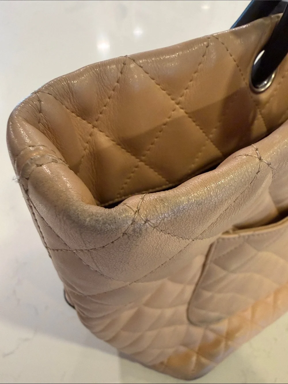 CHANEL Beige Quilted Tote with Black Accents